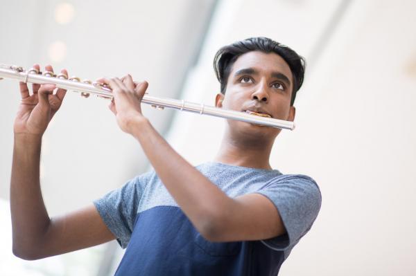 boy playing flute