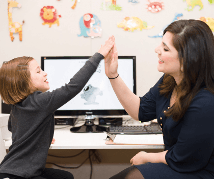 teacher teaching child