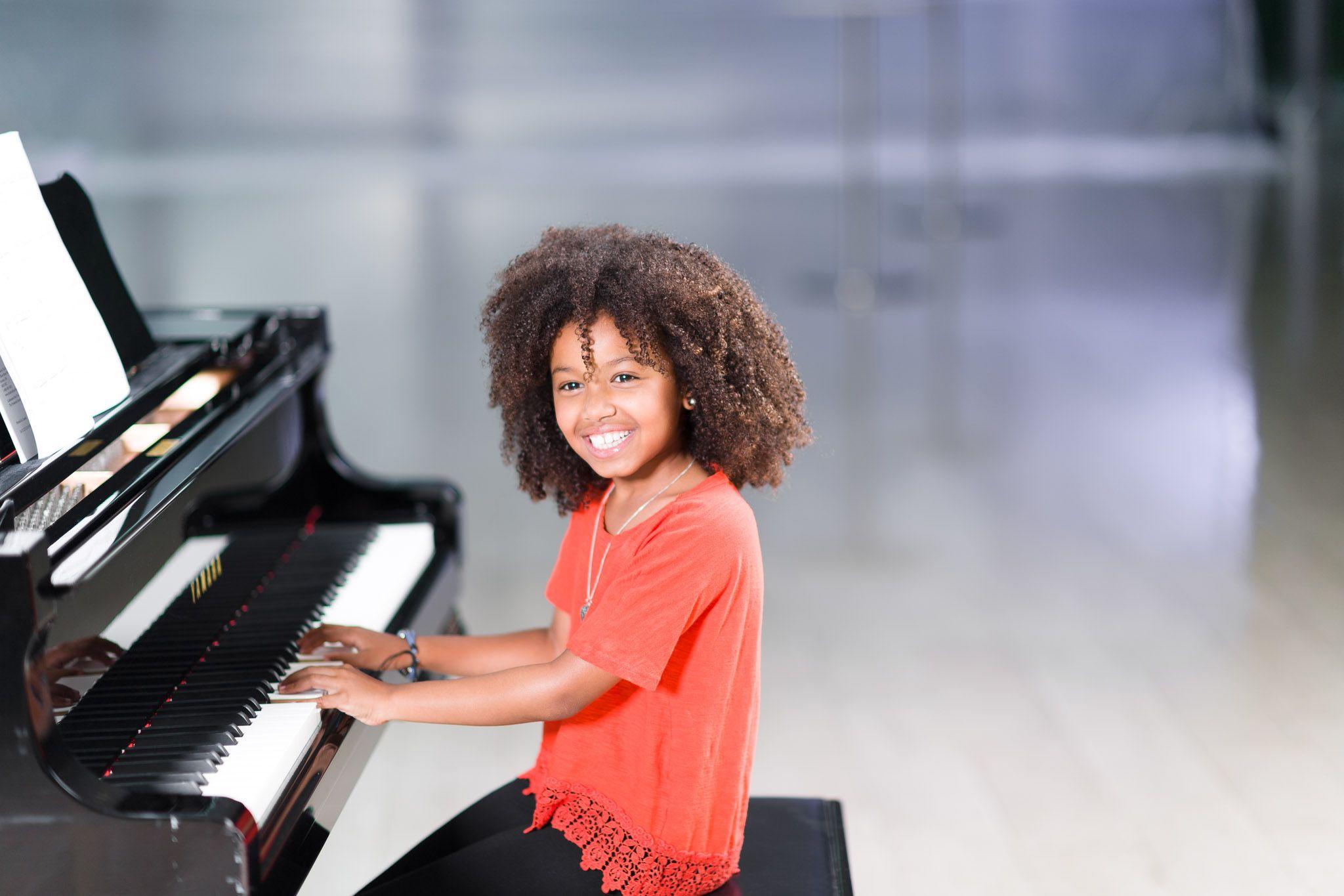 Student playing piano